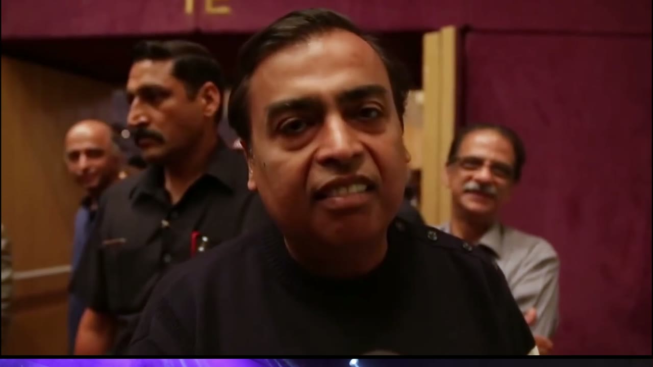 Mukesh Ambani arriving in the audience at a Bhavya Kavikala Arts show